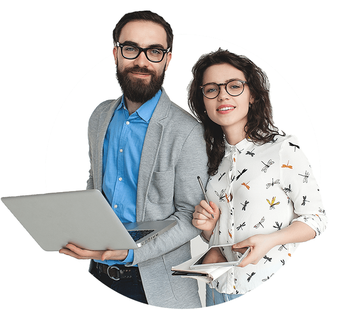 Man and women in business casual atire holding laptop and tablet