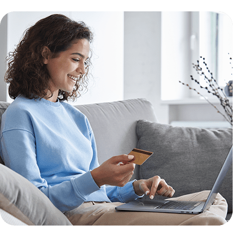 Women making purchase on laptopwith credit card