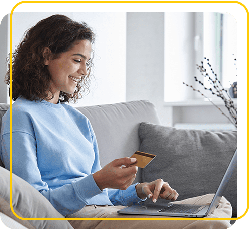 Women making purchase on laptopwith credit card