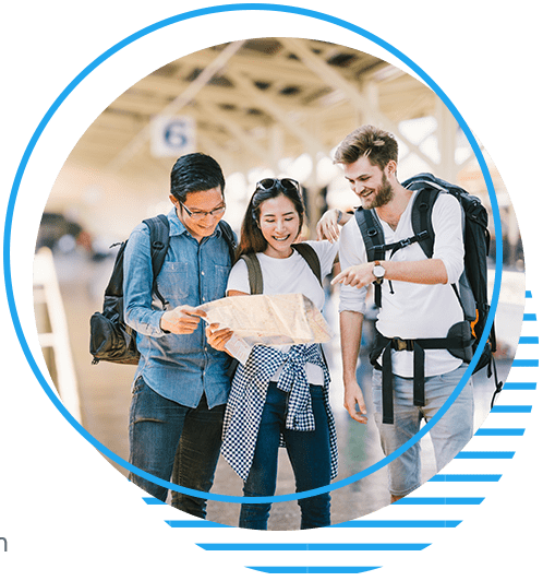 Young travelers looking at map