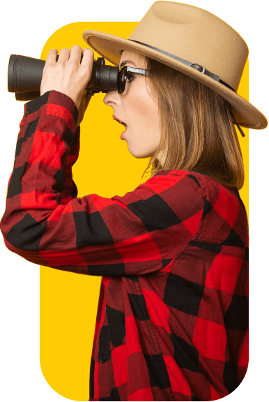 Women looks through binoculars
